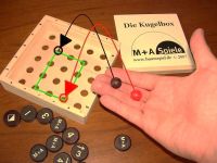 Die Kugelbox mit den 2 Spielen: Chikugo und Klau Genau von M+A Spiele